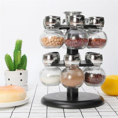 China 12Pcs Spice Jar Rack Storage Universal Viable Rotating Glass Organizer for sale