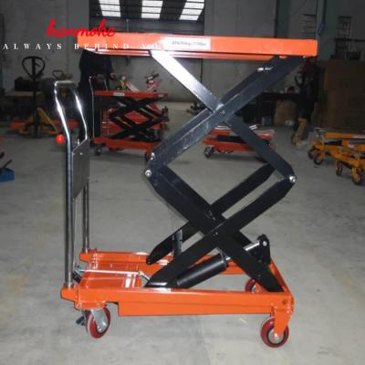 China Hotels Manual Scissor Lift Trolley, Portable Adjustable Work Platform for sale