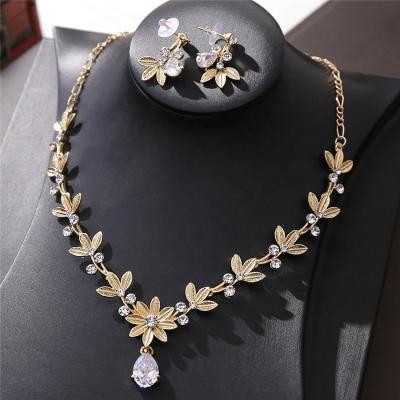 China FASHIONABLE Golden Crown Three Piece Set Bride Zircon Bridal Accessories Wedding Crown Tiara Necklace Earrings Jewelry Set for sale