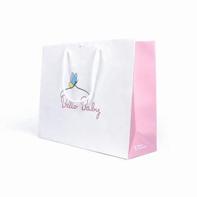 China Recycled Materials Art White Paper Bags Custom Logo Clothing Gift Paper Shopping Bags Packaging Bags for sale