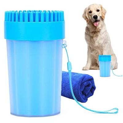 China Stocked 2 in 1 Portable Silicone Pet Cleaning Brush Feet Remover Dog Paw Cleaner Brush With Soft Towel For Large Dogs for sale