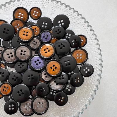 China Can be dry cleaned and washable high quality and environmentally friendly resin circular buckle for customized four hole costume buttons for sale