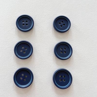 China Can be dry cleaned and washed high quality environmental friendly resin buttons, customized four circular hole costume buttons for sale