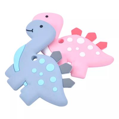 China Sensory Teether Dinosaur Shape Food Grade Silicone Toy Soft Bp Free Baby Teether Soft Toy COMEMOIR A New Design for sale