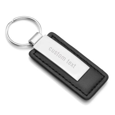 China Custom Leather Laser Engraved Metallic Wholesale Open Single Car PU White Logo Design Logo Faux Leather Key Chain for sale