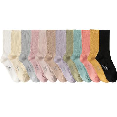 China Selling Color Cotton Ins Cotton Socks Breathable Pure Warm Loose Girls Young Lady Spring Summer Tube Teen Socks for sale