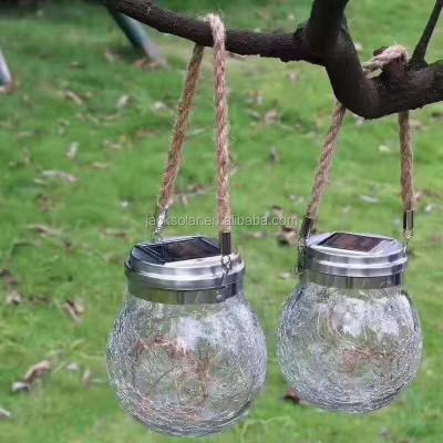 China 6 Months Whirl Solar Glass Jar Light In Outdoor Decoration With Pattern Waterproof Solar Hanging Lantern 2pcs/set for sale