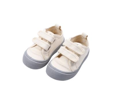 China New Fashion Round Children's Strap Canvas Shoes Soft Sneakers for sale