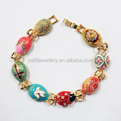 China Joan Rivers Russian Faberge Large Egg Link Brass Bracelet. for sale