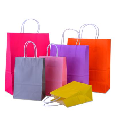 China Wholesale Customized Eco - Friendly Kraft Paper Bags Recyclable Hand Held Shopping Bags for sale