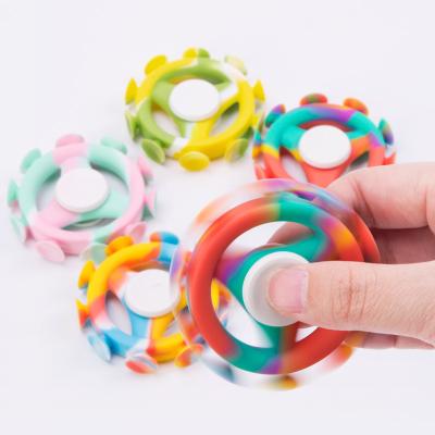 China 30-100g for different shape new product decompression sucker darts children's puzzle spins around music to exhale decompression toy fidget spinner for sale