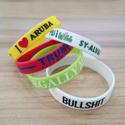 China Custom Printed Your Own Design Silicone Wristband Custom Logo Embossed Filled Color Wrist Band In Stock Solid Color For Event for sale