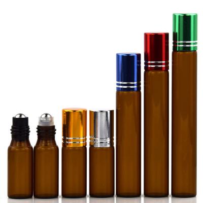 China 5ml 7ml 8ml 10ml 12ml concise cosmetic rose gold amber roll on glass bottles with metal rollerballs for essential oil packaging for sale