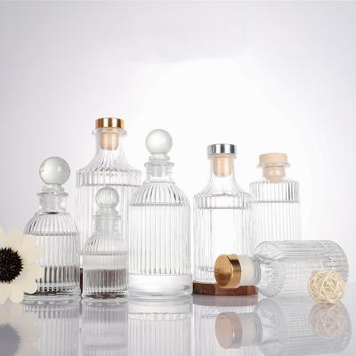 China Brew Home New Design Perfume Aroma Diffuser Bottles 150ml 200ml Aromatherapy Embossing Glass Bottles Jar Perfume Bottles for sale