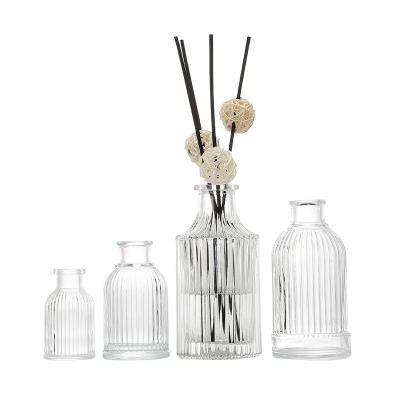 China Brew Home Aromatherapy Essential Oil Perfume Bottle Glass Transparent Empty 100ml Reed Diffuser Bottle for sale