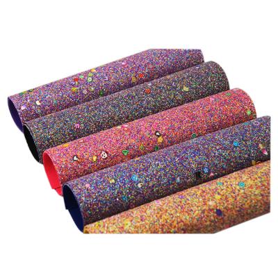 China PVC Rexine Viable Synthetic Leather Glitter Stock PU Leather Stock Leather For Craft Bows Bags for sale