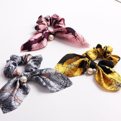 China Fashion Ponytail Holder Ladies Pearl Rabbit Ear Scrunchies Pearl Rabbit Ear Hair Scrunchies Wholesale Environmental Friendly Flower Printing for sale