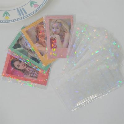 China Eco-Friendly custom 57x87mm rainbow effects penny sleeve holographic card sleeves shield magic card protective sleeve for sale