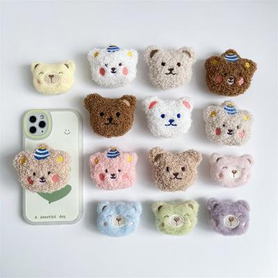 China Adjustable Factory Price Wholesale Mobile Accessories Cartoon Plush Bear Phone Holder For Any Phones Fluffy Socket Cell Phone Stand for sale