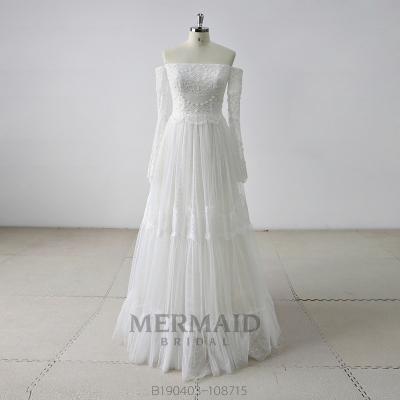 China Anti-Static Long Sleeve Boat Neck Beading Boho Wedding Dress for sale