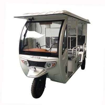 China New electric passenger tricycle passenger tricycle with cabin passenger electric tricycle for sale