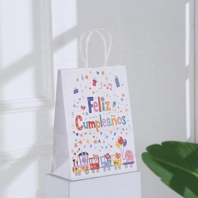 China Recycled Materials New kraft paper gift bag wholesale Spanish birthday gift bag candy packaging handbag for sale