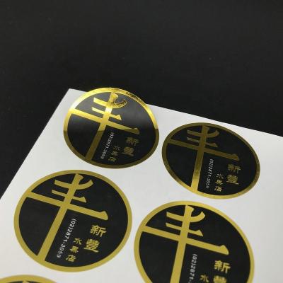 China PVC mute black self-adhesive self-adhesive label waterproof embossed sticker advertising trademark sticker sealing sticker golden printing for sale