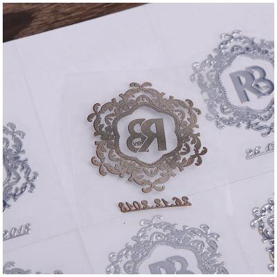 China Hollowed out metal special-shaped paste letter separation label logo waterproof self-adhesive sticker bronzing trademark UV transfer paste for sale