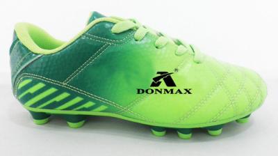 China OEM de Voetbalschoenen die van de Waterdichte Kinderen van de Grasdouane Pu Donmax rijgen Te koop