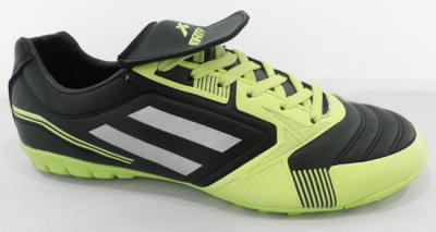 China Listones infantiles verdes/del negro interiores del fútbol, zapatos del fútbol del velcro de los muchachos en venta