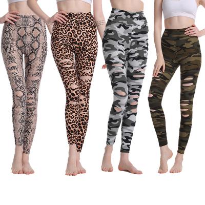 China 2021 New Lady Hollow Yoga Pants Hole Gaiters Sports Fitness Antibacterial Broken Tights Summer for sale