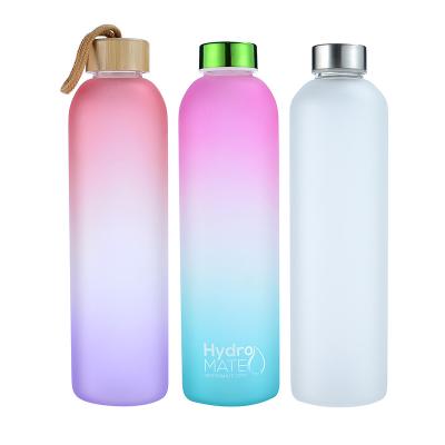 China High MOQ Sustainable Small Borosilicate Slight Burn 1000ml Custom Wall Frosted Glass Water Bottle With Bamboo Lids for sale