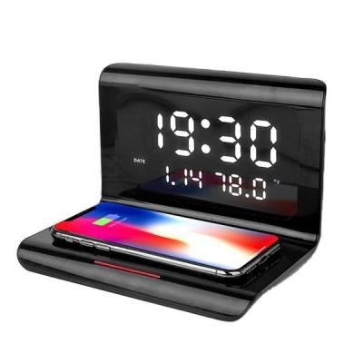 China Earphone factory wholesale mobile phone charger digital clock wireless charging alarm clock for sale