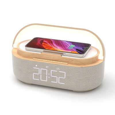 China Blue Smart Watch Wireless Charger Alarm Clock Fast Charging Tooth Speaker with Wireless Charger and Clock for sale