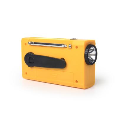 China Multifunctional Emergency Backup Dynamo AM/FM/SW Radio Led Flood Light With Clock for sale