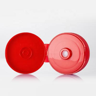 China Non Spill 53mm 38-400 Sprial Mouth Flip Screw Cap With X Cut Silicone Valve For Squeezable Bottle Plastic Bag for sale