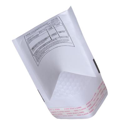 China Shock Resistance White Customized Printed Compostable Packaging Bags Kraft Shipping Wraps Kraft Bubble Mailers With Logo for sale