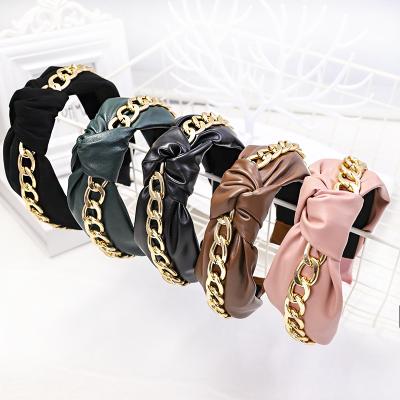 China Boutique HB510 Fashion Knotted Wide Brim Medium Wide Brim PU Knot Headband Popular Women's Hair Accessories Leather Chain Zipper Headband for sale