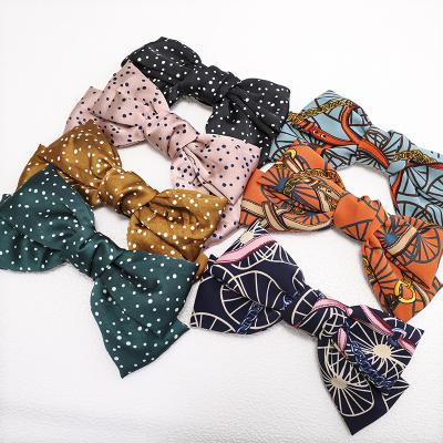 China HC396 Eco-friendly baby hair accessories baby bow hair clip kids fabric bulk printed hair clips for girls for sale