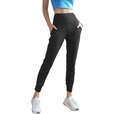 China Seamless High Waist With Pocket Training Stretch Tights Tights Pants Sports Comfortable Skinny Gaiters Yoga Breathable Jogging Pants for sale