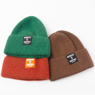 China Different Colors Beanie Cap With Woven Patch Logo Knitted Hat Custom Made Winter High Quality COMMON From Wholesaler for sale