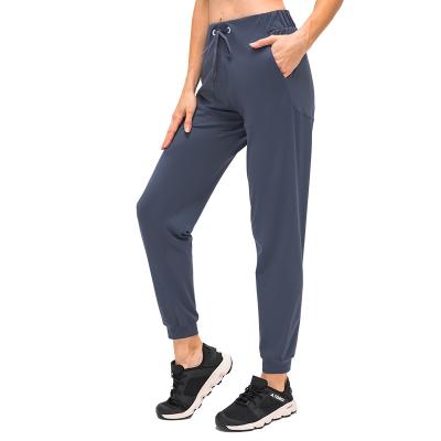 China Breathable Women Jogger Pants Suite High Waist Workout Pants Commuter Gym Pants With Pockets for sale