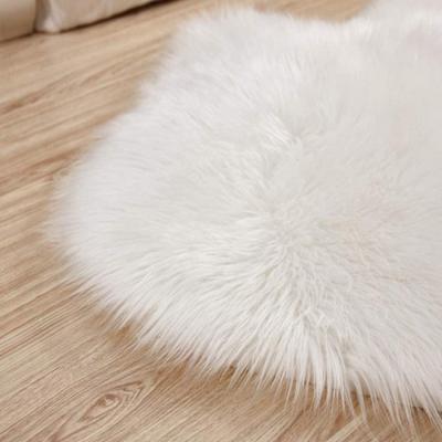 China Hot selling anti-slip comfortable modern fashion soft animal shaggy living room door rugs cheap carpet floor for sale