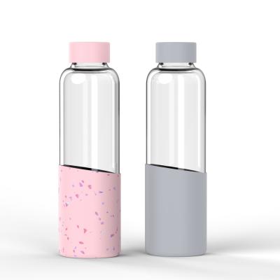 China Bpa Sustainable Reusable Free Glass Drinking Water Bottles With Time Marker Reminder Glass Water Bottle With Silicone Sleeve for sale