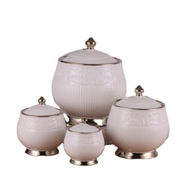 China Sustainable Nordic Style Embossed White Kitchen Canister Ceramic Items Food Storage Jars For Coffee Tea Sugar for sale