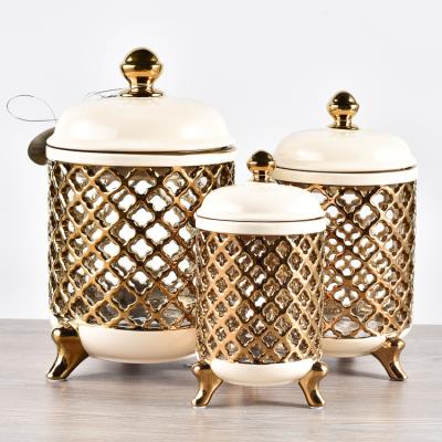 China Dubai Good Quality Royal Viable Wholesale Gold Storage Jar Coffee Tea Coffee Canister Sets Good Quality Kitchenware Food Tableware Holes With Lid for sale