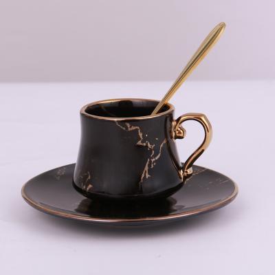 China Sustainable Luxury Gold Hotel Black Ceramic Coffee Mug Ceramic Cup Saucer for sale