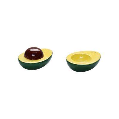 China Wholesale Betel Nut Stocked Form Salt And Pepper Shaker Set Kitchen Accessories For Yellow Ceramic Home for sale