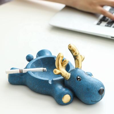 China Fashionable Girl's Ash Ashtray Animal Shape Lovely Resin Anti Fly Wind Deer Ornaments Living Room Home Office Creative Home Decoration for sale