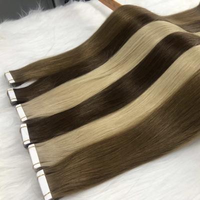 China Wholesale Cheap European 100% Virgin Silky Straight Wave Hair Extensions In Dubai Double Sided Cuticle Tape Remy Hair Extensions for sale